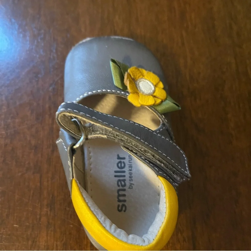 Gray Baby Shoes with Yellow Flower Accent